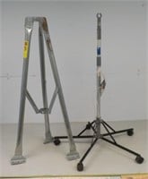 Pole stand and IV stand on rollers.