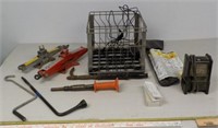 Car jack, nail puller and concrete ram set.