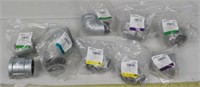 Assortment of pipe fittings. New.