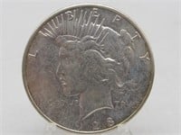 1928 S PEACE SILVER DOLLAR TONED MS62+