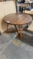 (L)  MALIYAH ROUND-OVAL EXT TABLE WALNUT BROWN.