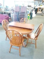 Pedestal Table Measures 42" Diameter, has Leaf