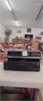 GE digital clock stereo and sansui vhs player