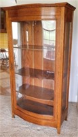 Antique Tiger Oak curved front glass china cabinet