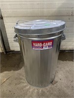 Garbage can with grass seed