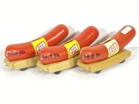 Three Oscar Mayer Wienermobile Banks