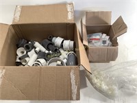 Assortment of Plastic Pipe Fittings.