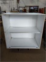 An awesome large, tall, deep white shelf measures