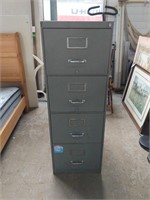A 4 shelf filing cabinet measures to be 18" x 28"