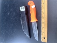 Cutco model 5718 hunting knife with orange handle,
