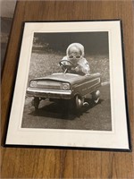 Framed Child in A Pedal Car