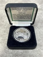 1 oz silver John Deere tractor round