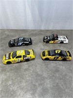 Die cast scale model NASCAR stock cars and signed