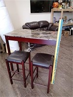 Bar height table and two stools