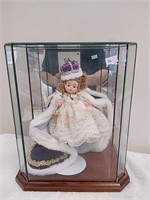 Collectible doll with glass case