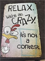 Relax  we’re all crazy metal sign 8” x 12”