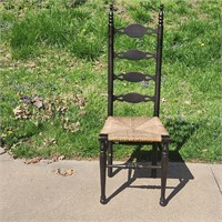 Antique cane bottom ladder back chair.