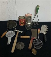 Vintage utensils and a tin