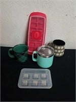 Yeti coffee mug, ice cube trays, another coffee