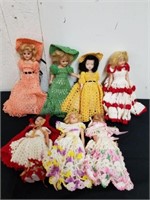 Vintage dolls with crocheted outfits