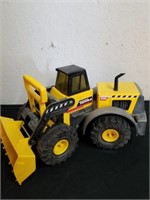 Metal and plastic Tonka tractor