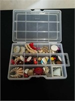 Small divided container with bits and pieces of