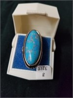 Size 8 ring with turquoise colored Stone