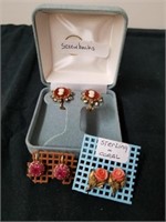 Three pairs of vintage earrings screw box one is