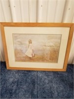 Framed & matted picture of a girl holding a