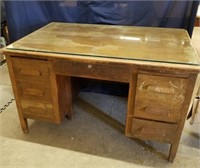 Large vintage heavy wood desk with glass top 30.5