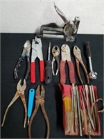 Group of Rusty tools, and a stapler