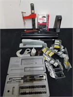 Brackets, three hole punches, staplers,