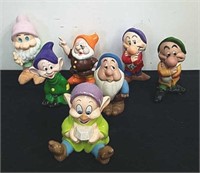 Several of the seven dwarfs and a dopey piggy
