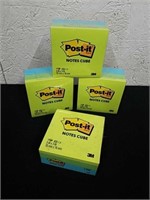 Four new packages of Post-it note cubes