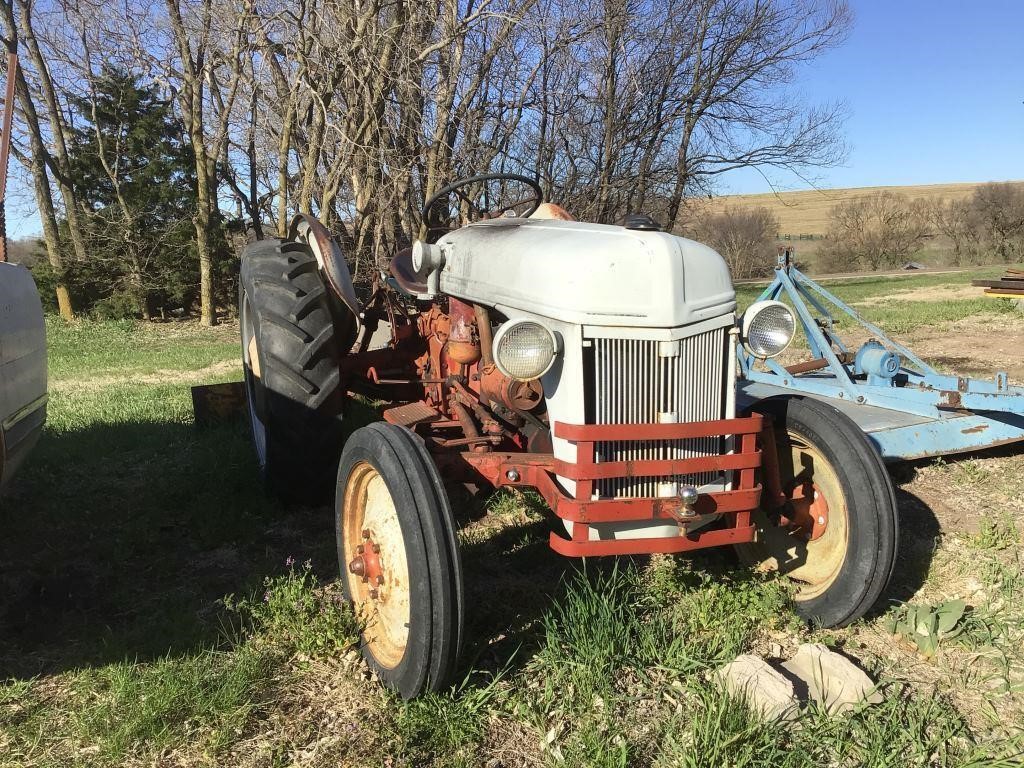 Ford tractor, with 4 foot blade, tires good, runs