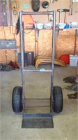 Large handmade black dolly. Tires are 16" .