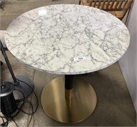 Round Marble Like Table.