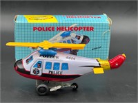 Tin Litho Police Fire Chief Helicopter Wind-Up Toy
