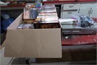 LARGE BOX OF VCR TAPES & SANYO DVD/VCR PLAYER