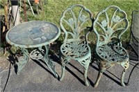 Weathered Cast Metal Patio Table and Chair Set