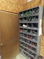 Steel shelving unit w/cable wiring contents.