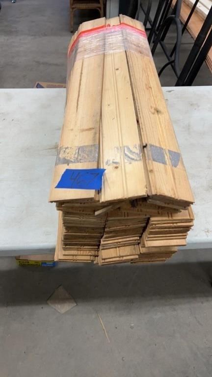 Stack of tongue and groove boards 31 1/2” x 3