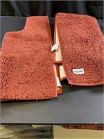 Burnt Orange Colored Bath Mats, one for toilet,