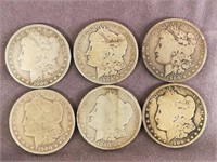 (6) 1900 O Morgan Dollar