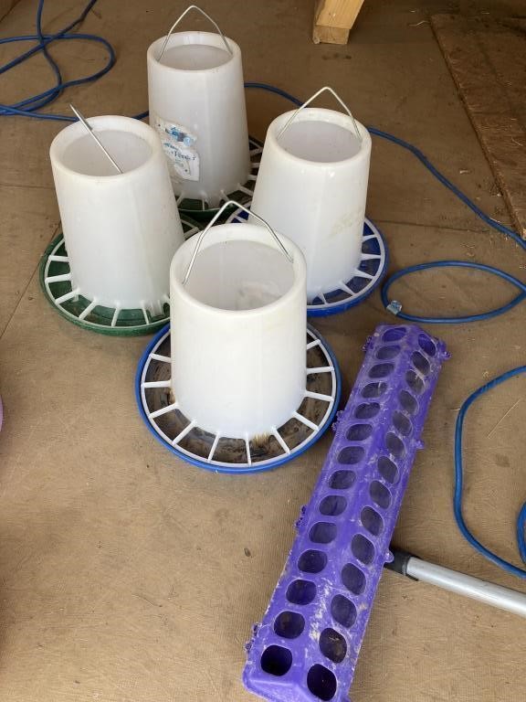 Five chicken feeders