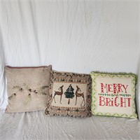 Three christmas pillows