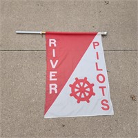 River Pilots flag and pole.