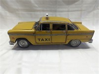 Rustic 1980 New York Taxi metal 11" toy