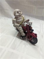 Michelin Man on motorcycle cast iron figure