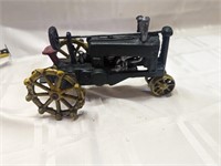 Cast iron tractor toy